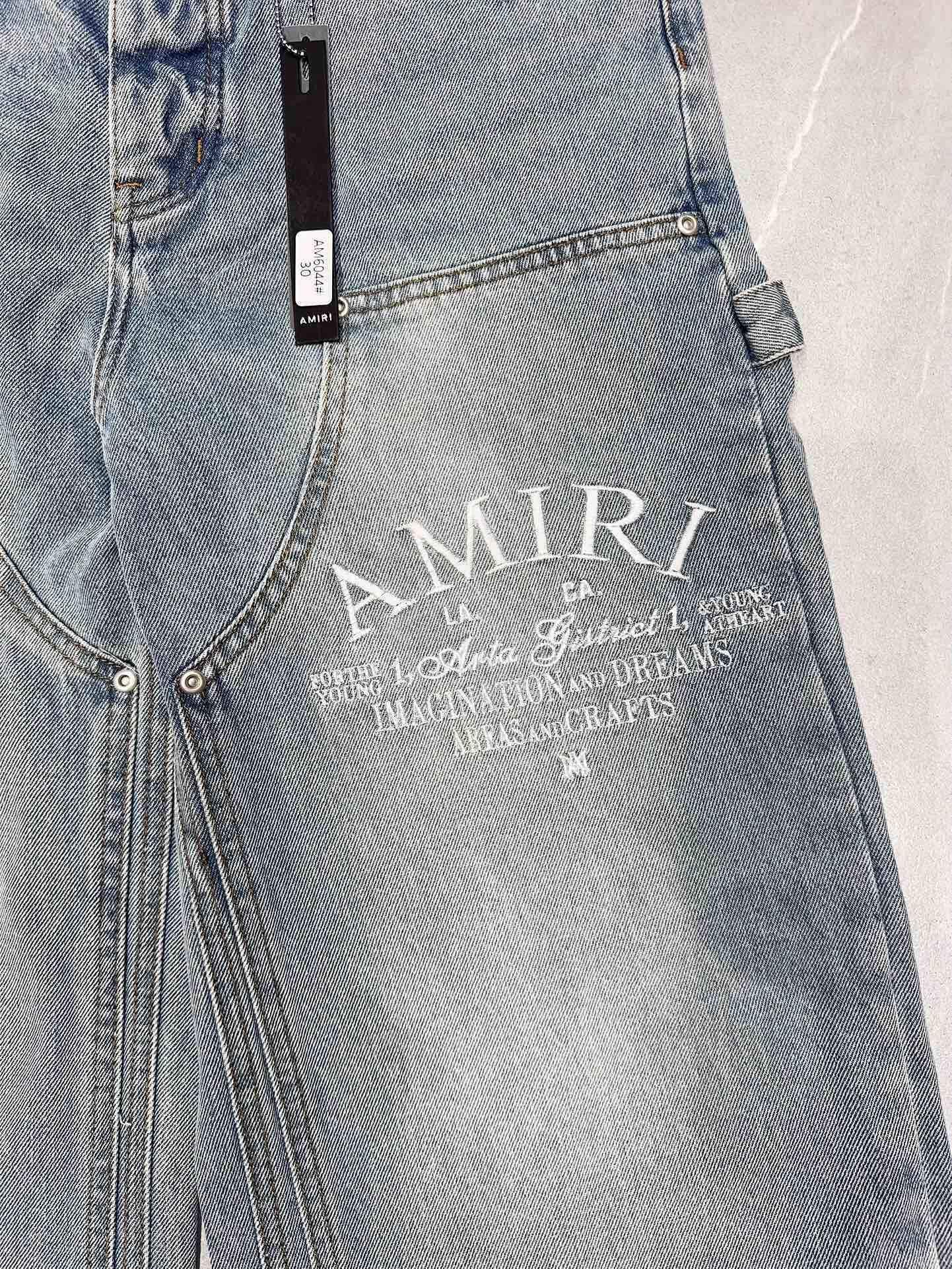AMIRI | 0036-F75-FE Jeans | Distressed Slim Fit | Medium Vintage Wash Amiri