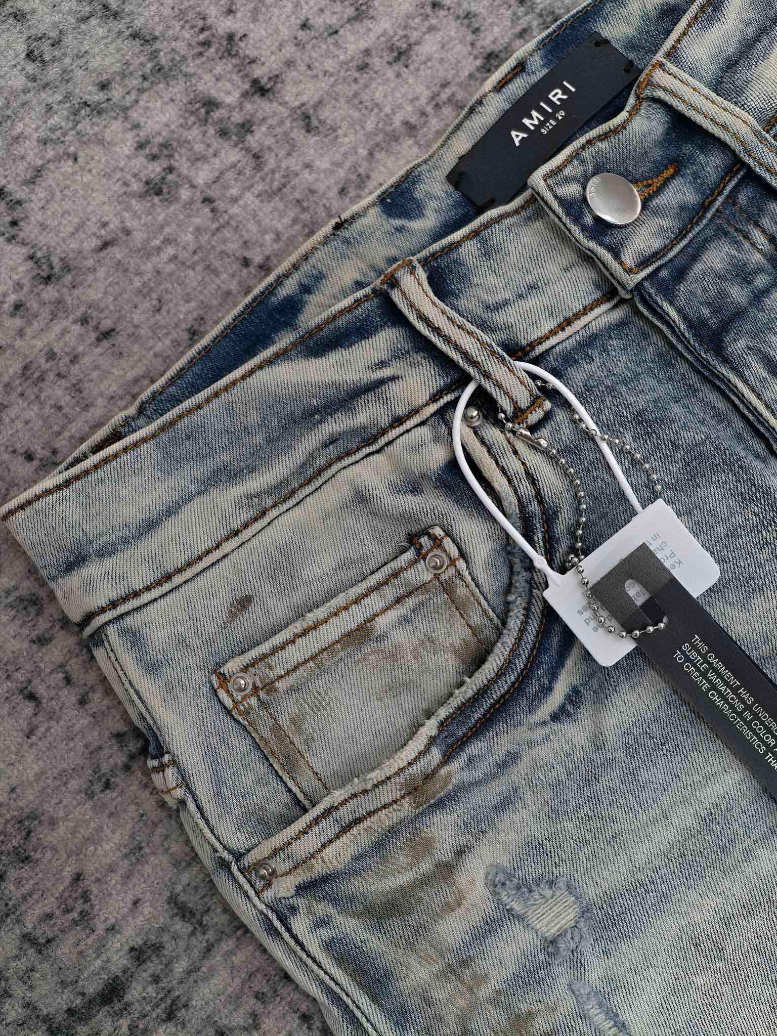 Amiri | MX1 Distressed Blue Skinny Jeans with Pink Leather Knee Patches