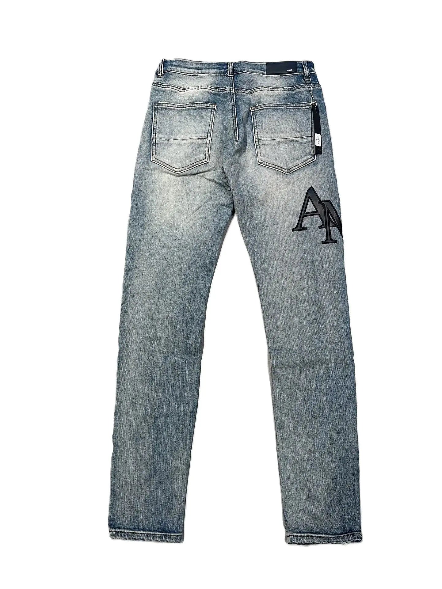 Amiri | MRH Monogram Embroidered Denim Jeans | Light Wash Blue Amiri
