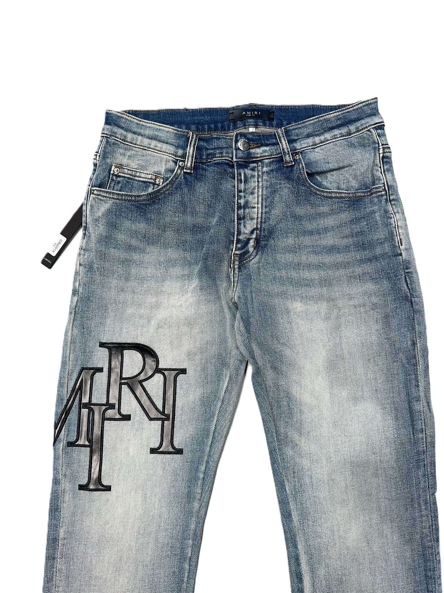 Amiri | MRH Monogram Embroidered Denim Jeans | Light Wash Blue Amiri