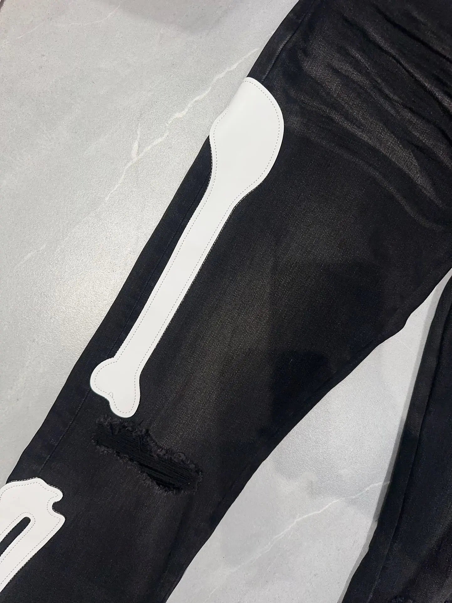 Amiri | Skeleton Bone Patch Skinny Jeans | Black Wash Denim Amiri