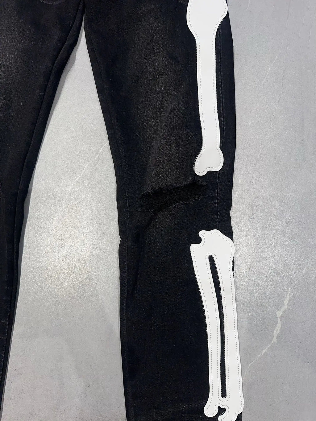 Amiri | Skeleton Bone Patch Skinny Jeans | Black Wash Denim Amiri