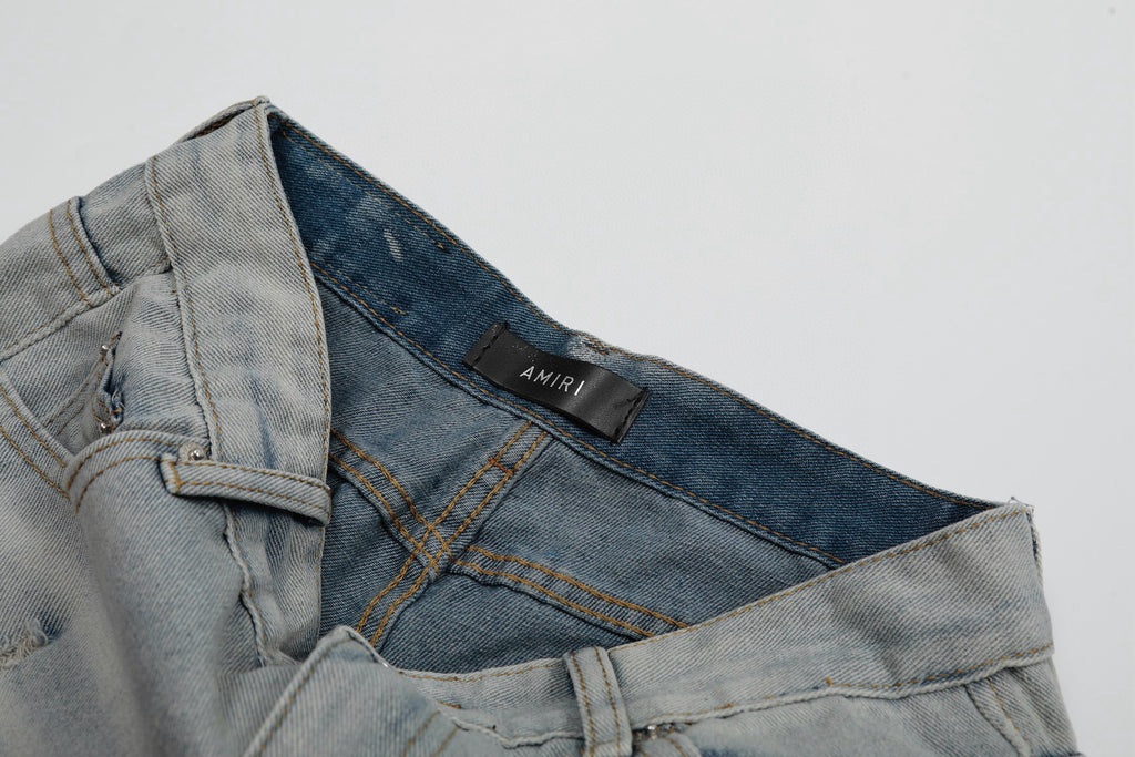 Amiri | MX1 Leather Patch Distressed Jeans | Indigo